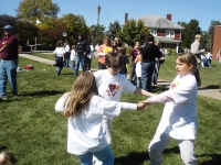 Maura, Kevin & Christine dancing on the lawn